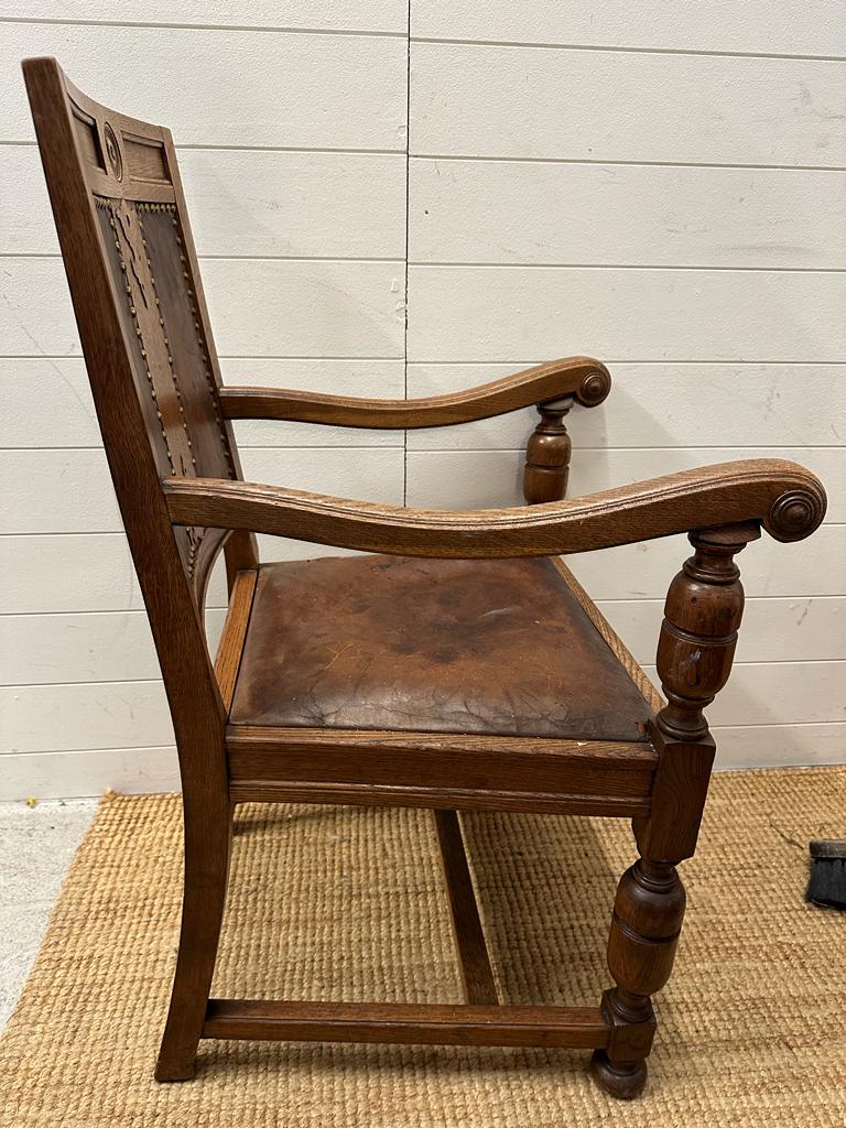 An oak carved leather seated arm chair on turned supports and legs - Image 3 of 5