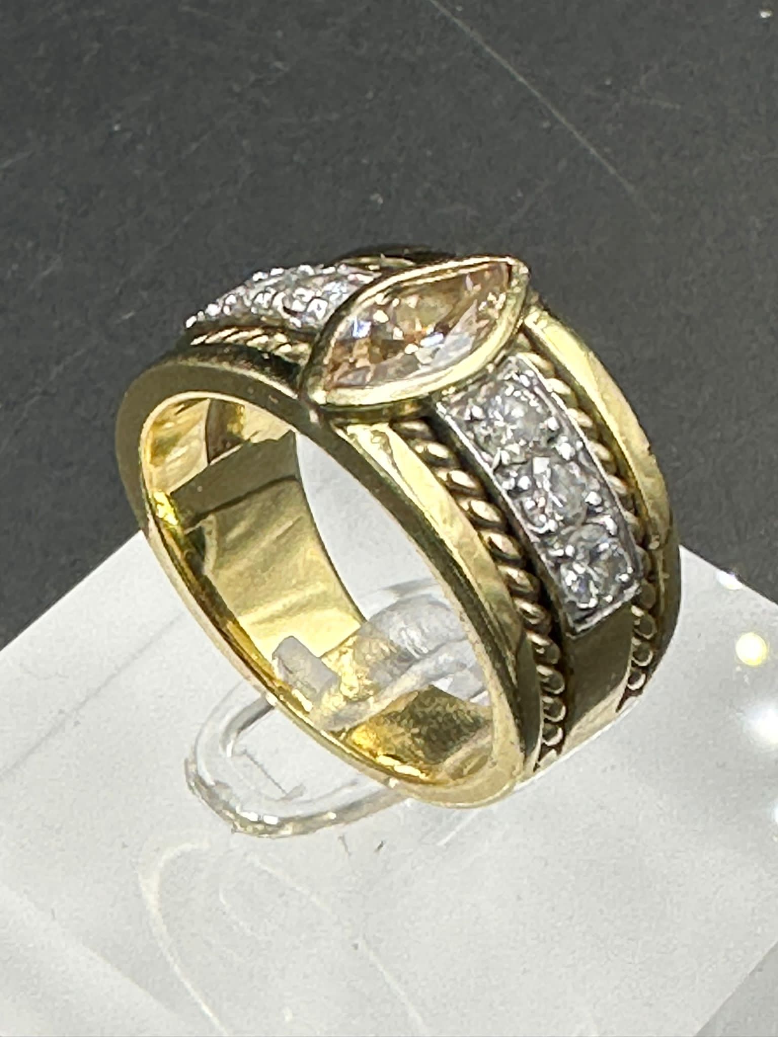 A yellow gold diamond ring with central stone and three separate diamonds to each side . - Image 3 of 3