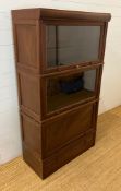 A four tier Globe Wernicke style cabinet (H150cm W80cm D39cm)