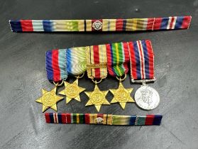 WWII Medal miniatures along with two medal bars. 1939-45 Star, The Atlantic Star, The Africa Star,