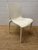 A white contemporary "Hidra" dining chair by Bontempi Casa