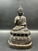 A small Tibetan bronze statue