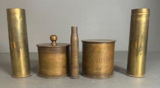 A selection of trench art to include tobacco jars etc.