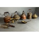 A selection of brass and copper kettles