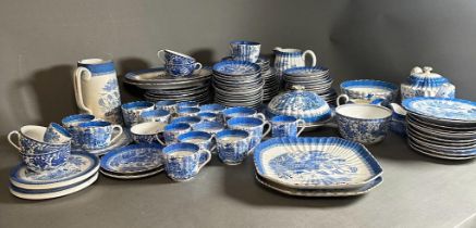 A substantial amount of blue and white china dinner service