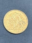 A 1908 Gold half sovereign
