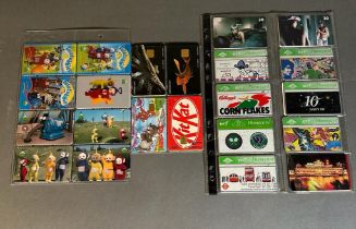 A selection of collectable phone cards to include Telly Tubbies