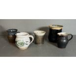 Five Studio pottery items, jugs, a vase and a beaker