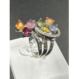 A 14ct white gold cocktail ring with diamonds and semi precious stones (Approximate Total Weight