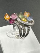 A 14ct white gold cocktail ring with diamonds and semi precious stones (Approximate Total Weight