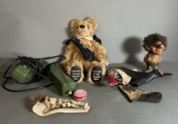 A selection of play worn vintage toys to include a yoyo, teddy bear and a troll