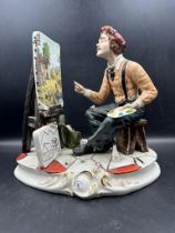 A large Capodimonte figure of an artist by Fiorenzo Meneghetti. Number 421 of a numbered edition
