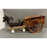 A ceramic horse and cart