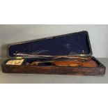 A violin in a rosewood case, new strings and hairs needed for bow and violin.