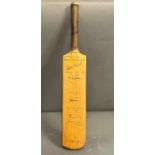 A signed miniature cricket bat, England V Pakistan 1934 (46cm)