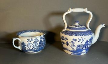 Two blue and white chinese style ceramics. A tea pot and a chamber pot