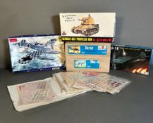 A selection of four boxed model kits, Amodel, Toko and Esci along with a variety of Decals