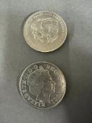 A 2001 £5 coin and a 1981 Price Of Wales and Lady Diana Spencer