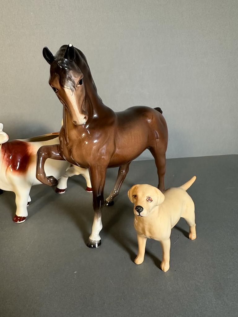 A selection of three Beswick figures and a cow creamer - Image 4 of 5