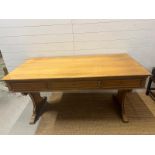 A writing or library table with three drawers (H79cm W160cm D80cm)