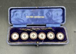 A Boxed set of silver mounted shirt buttons being sold to raise funds for Fordbridge Day Centre,