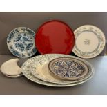 A selection of china serving dishes, platters and cake stand, various makers and sizes