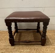 An oak brown faux leather upholstered on turned legs with cross stretcher (H31cm)