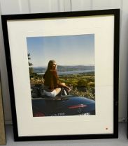 Framed photograph of a lady sat on a Mercedes SLK 2000 (Framed size 48cm x 58cm)