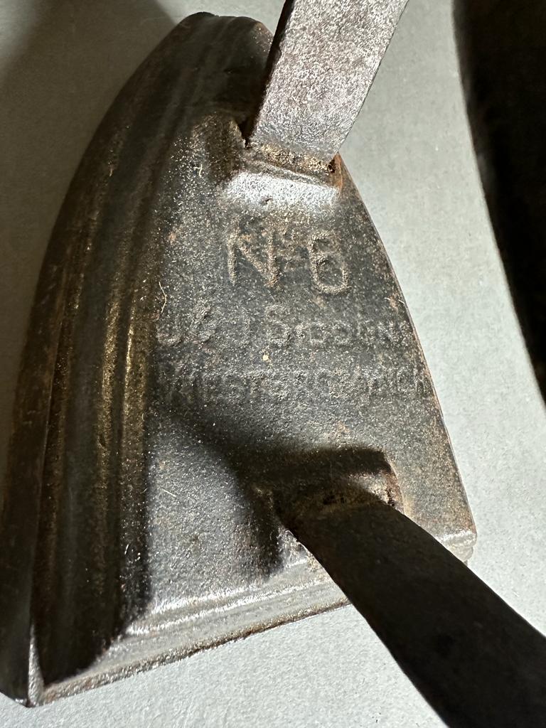 Two vintage cast iron irons and a iron trivel - Image 3 of 5