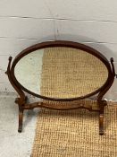 A mahogany toilet mirror 56cm x 56cm