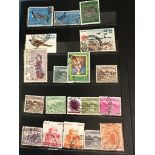 A selection of four albums of UK and World stamps, various countries and ages