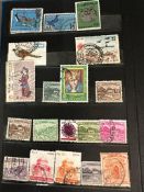 A selection of four albums of UK and World stamps, various countries and ages