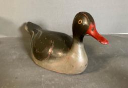 A wooden painted duck