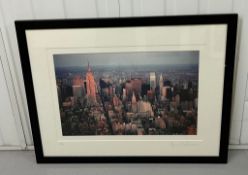 A limited edition photograph of the New York sky line. signed in pencil Number 13 of 22.