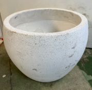 A contemporary planter in white