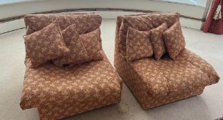 A pair of Zanotta armchairs as standalone or as a two seater sofa (78cm W x 78cm H x 84cm D)