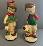 Two vintage plaster figurines of a girl and boy with their dogs (H33cm) AF