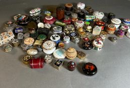 A Large selection of pill boxes to include porcelain, silver etc. Various makers and marks.
