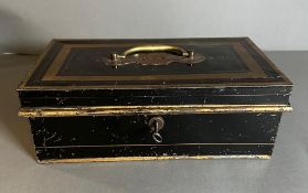 A Tala Moneybox with key.