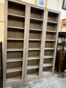 A set of three bookcases (H220cm W55cm D29cm)