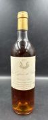 A bottle of 1984 Les Cypres De Climens Sauternes