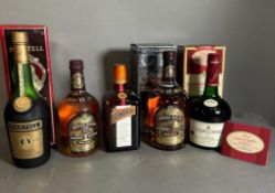 Five Bottles of spirits to include: Two bottles of Chivas Regal, along with bottles of Cointreau,