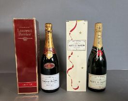 A Bottle Of Laurent Perrier Champagne and a Bottle of Moet and Chandon Champagne