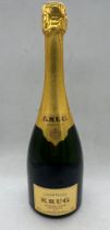 A bottle of Krug Grande Cuvee Champagne 170th Edition.