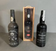 Three bottles of vintage port, A Feuerheerd 1985, a Delaforce 1977 and a Cockburns 1997