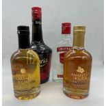 A selection of four bottles of Spirits to include: Tia Maria, Smirnoff Vodka, Amaretto Liqueur and