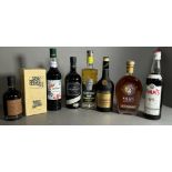 Eight assorted bottles of spirits and liqueurs to include Gin, Rum Pimms No 1 etc.
