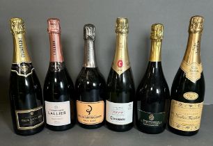 A selection of six bottles of champagne various styles, makers and years.