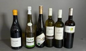 A selection of six bottles of white wine, various styles, makers and years.