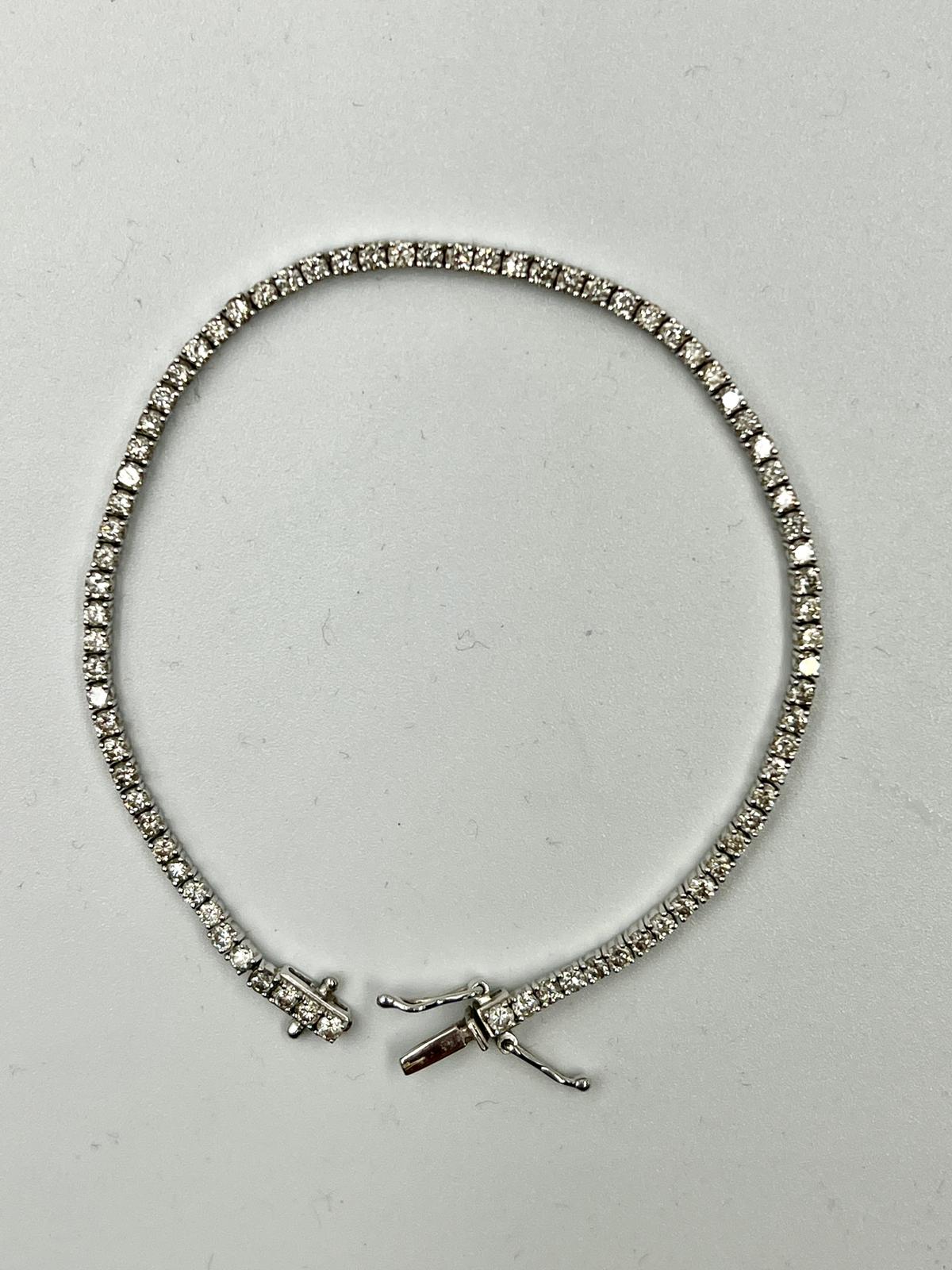 An 18ct white gold Tennis or line bracelet set with approximately 3ct of diamonds. - Image 23 of 25